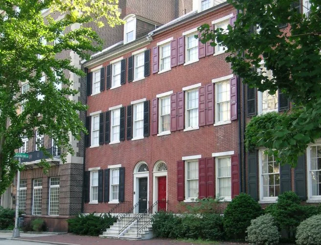 Real estate agent helping client search for homes